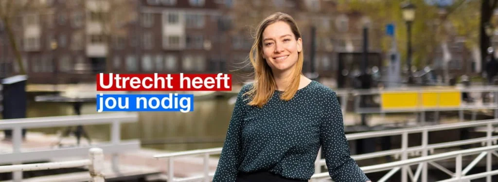 Lachende vrouw. Tekst in beeld: Utrecht heeft jou nodig